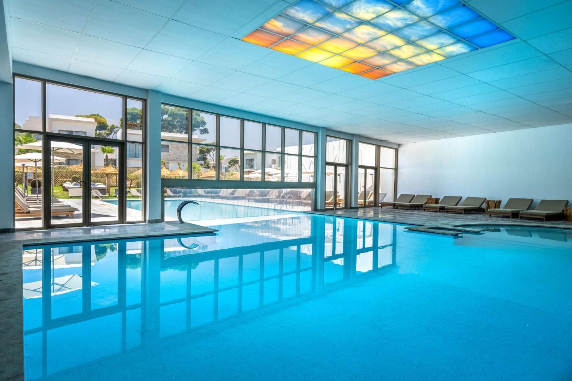 Radisson Blu Resort Al Hoceïma Zewnętrze zdjęcie The swimming pool at the hotel